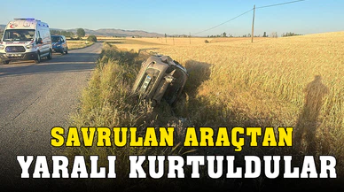 Şarampole devrilen otomobilden şans eseri yaralı kurtuldular