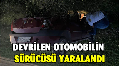 Devrilen otomobilin sürücüsü yaralandı