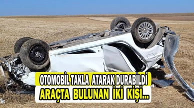 Devrilen otomobilde 2 kişi yaralandı   