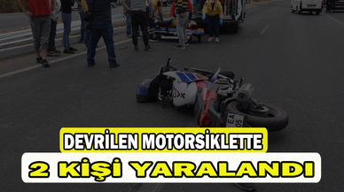 Devrilen motosiklette 2 kişi yaralandı   
