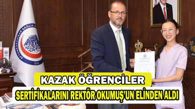 AFSÜ Rektörü Okumuş, Eğitimini Tamamlayan Kazak Öğrencimize Sertifika Takdim Etti