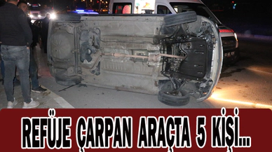 Refüje çarpıp takla atan araçta aynı aileden 5 kişi yaralandı
