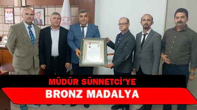 Müdür Sünnetci’ye bronz madalya
