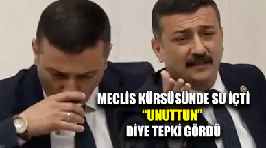 Genel Kurul'da milletvekillerine hitap ederken su içti